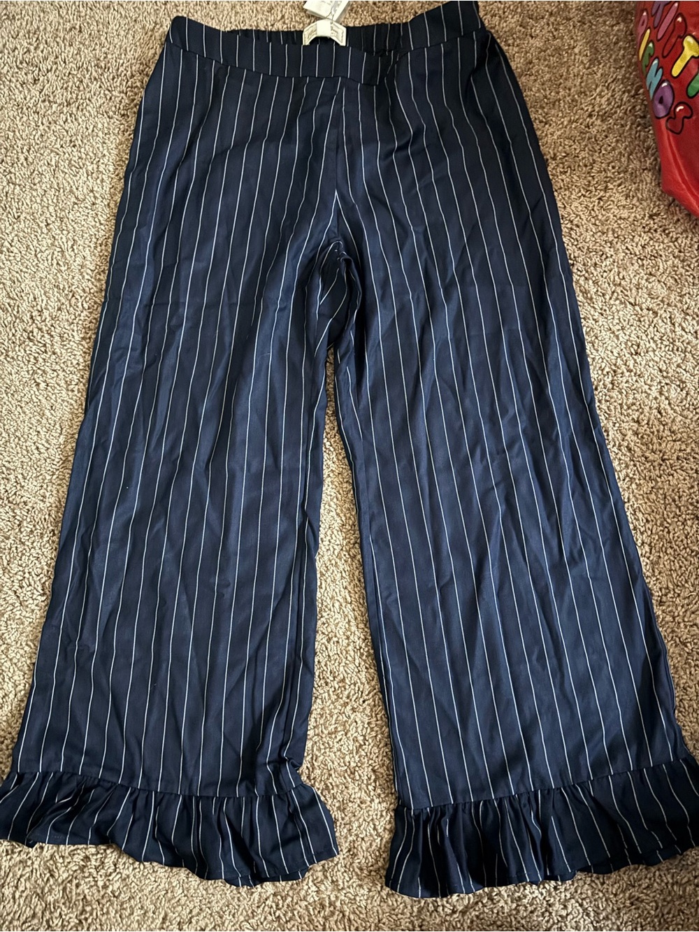 Navy Pinstripe Ruffle-Hem Ankle Pants